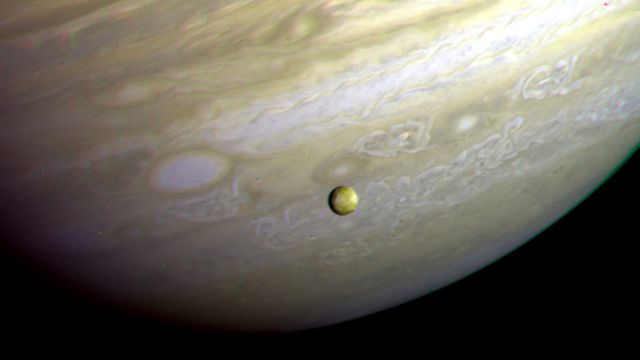 Jupiter And Io Photographed By Voyager 2